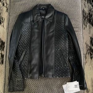 Beautiful leather ladies jacket. Black and brand new with tags.